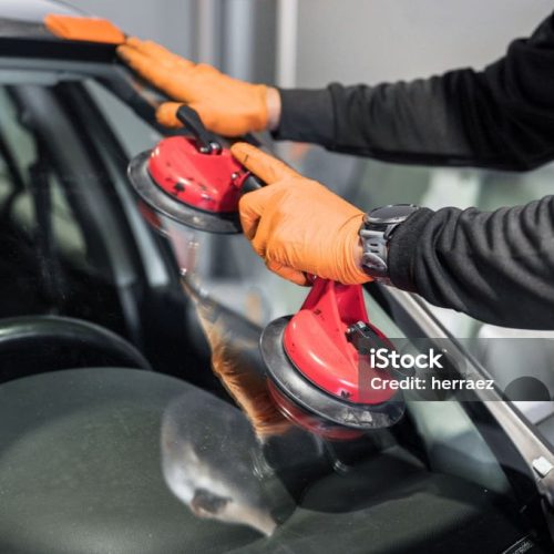 Auto Glass Repair and Replacement, close up. High quality photo